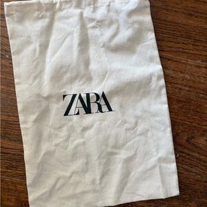 Zara Canvas Drawstring Pouch in White with Black Logo